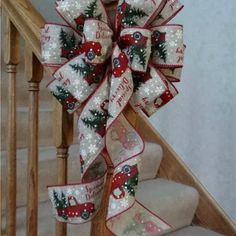 a christmas themed bow on the banister