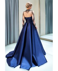 Buy Navy Blue Long Sleeve Beaded Formal Evening Gown With Sheer Top at affordable price online. Free shipping and pro custom service since 2009. Satin Prom Dress With Sleeves, Navy Blue Ball Gown, High Neck Evening Dress, Dress With Crystals, Elegant Evening Dresses Long, Royal Blue Evening Dress, Blue Ball Gown, Illusion Sleeves, Ball Gown Prom Dress