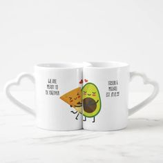 two coffee mugs with funny illustrations on them