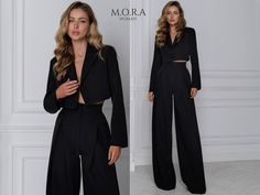 Refresh your wardrobe with this elegant Cropped Blazer and Palazzo Pants Suit! The perfect blend of style and comfort, this suit will accentuate your individuality and add sophistication to your look. Crafted from high-quality materials, this suit will be a sleek and elegant addition to your everyday or business attire. Feel confident and stylish in this refined ensemble, perfect for any occasion from work meetings to special evening events. Showcase your refinement and elegance in this stunning Elegant Two-piece Pant Set For Work, Formal Two-piece Pant Set With Long Sleeves, Formal Two-piece Long Sleeve Pant Set, Formal Fitted Two-piece Pant Set, Elegant Two-piece Bottoms For Formal Occasions, Elegant Two-piece Formal Bottoms, Suit Cropped Blazer, Formal Pant Suit, Suit Palazzo