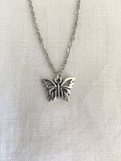 This dainty necklace with a butterfly pendant (1,5cm)  is 42cm long and made from nickel free metal.  I could also provide a pair of matching earrings, if need be, just contact me. :-) Nature Spring, Butterfly Pendant, A Butterfly, Dainty Necklace, Matching Earrings, Pendant Necklaces, Jewelry Necklace Pendant, Silver Necklace, Etsy Accessories