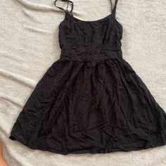 Never Worn Black Sundress For Spring Party, Black Spring Party Sundress, Black Party Sundress For Spring, Black A-line Mini Dress For Day Out, Elegant Black A-line Sundress, Black Lined Mini Dress, Black Lined Mini Length Dresses, Casual Black A-line Mini Dress, Casual Black A-line Dress