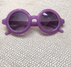 Round Tinted Sunglasses For Party, Round Tinted Sunglasses For Parties, Party Sunglasses With Tinted Round Lenses, Round Tinted Lens Sunglasses For Parties, Plastic Round Frame Sunglasses With Uv Protection, Round Glass Sunglasses With Tinted Lenses, Fun Purple Sunglasses For Summer, Plastic Round Frame Sunglasses With Tinted Lenses, Purple Plastic Sunglasses For Summer