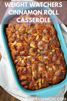 a casserole dish with cinnamon rolls in it and the words, weight watchers cinnamon roll casserole