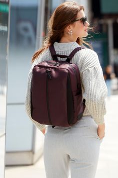 With a sleek aesthetic and smart details, the LEIGH Backpack is lightweight, practical and versatile as a daypack and travel bag. Custom antimicrobial linings are woven with real silver fibers to stop microbes from growing, preventing odor for the lifetime of the bag. Pack shoes upright in three different compartments to protect your footwear from crushing, and to keep separate from clothing. Dual exterior pockets are ideal for quick-access. A sensibly designed luggage handle pass-through double Water Canister, Sleek Aesthetic, Black Clouds, Bag Pack, Travel Bag, Leather Backpack, Sleek, Backpacks, Exterior