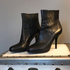 Never Worn! Beautiful Black Vince Pullon Leather Bootie. Covered Elastic For Easy On And Off. Rounded Toe. 4 1/4” Heel. 1/2” Hidden Platform. Leather Booties With Reinforced Heel For Night Out, Elegant Leather Booties With Padded Ankle, Fitted Leather Booties With Closed Toe, Leather Heeled Boots With Padded Ankle For Night Out, Formal Leather Booties With Padded Ankle, Elegant Fitted Leather Booties, Chic Formal Booties With Padded Ankle, Black Patent Leather Lace-up Boots With Round Toe, Black Patent Leather Lace-up Boots With Reinforced Heel