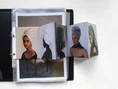 an open book with pictures of women in turbans on it's pages