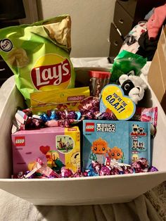 a bowl filled with lots of candy and candies