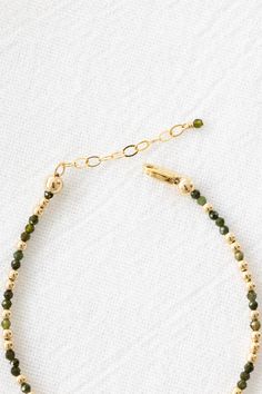 14k gold filled bracelet with 2mm green tourmaline gemstones and 2.5mm gold filled beads Comes with an attached 1" extender chain! If you would like a different length that is not listed, please contact us for a custom order! Bar Jewelry, Jewelry Workshop, Tourmaline Beads, Anklet Bracelet, Stamped Jewelry, Tourmaline Gemstone, Green Tourmaline, Birthstone Necklace, Locket Necklace