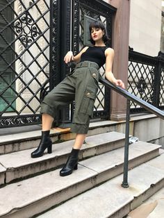 Marc Jacobs Rarecembellished dark green cargo pants, 100% wool, 100% silk lining, 4 hidden button closure, comes w/ belt which includes 4 snaps closures, 6 pockets, front pockets wrap around to the back, gold button on front and back of each pocket, 3/4 length, circle stitching around the crotch, Made in the USA. Originally $1,900. measurements taken while lying flat, double for circumference Shoulders  Waist 13", hip 19", waist to crotch 14, length 29", width 12" Green Cargo Style Parachute Workwear Pants, Green Cargo Style Parachute Pants For Work, Military Style Green Cargo Pants For Workwear, Green Parachute Pants With Multiple Pockets For Work, Green Parachute Work Pants With Multiple Pockets, Green Parachute Workwear Pants With Multiple Pockets, Green Military Style Bottoms For Fall, Olive Cargo Pants For Workwear With Belt Loops, Green Military Bottoms For Fall