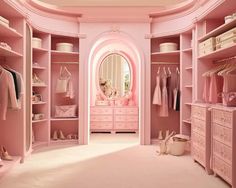 a pink closet with lots of clothes and shoes