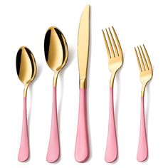 pink and gold utensils are lined up on a white surface with one fork, the other two spoons