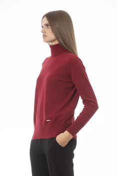 Elevate your knitwear repertoire with the epitome of Italian elegance by Baldinini Trend. This sumptuous turtleneck sweater embodies sophisticated warmth; a harmonious blend of 50% wool and 50% cashmere ensures a luxuriously soft touch. The vibrant red hue demands attention, while the fine ribbed knit at the neck cuffs, and hem add a refined texture. Accented with a chic monogram in metal, this sweater is a testament to Baldinini Trend’s commitment to luxury and style. Material: 50% Wool, 50% Ca Women Turtleneck, Turtleneck Style, Sweater Turtleneck, Cashmere Color, Sweater Trends, Womens Turtleneck, Women Sweater, Perfect Wardrobe, Red Wool