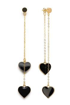 Elevate your style and self-love with these unique Single-Hearted Girl Earrings by Rejected Hearts Club. These stunning earrings feature a double enameled heart charm in your choice of black or white, dangling from a gold-filled double chain. Our enameled heart earrings are the perfect statement piece to remind you that you're more than enough. They're also a great gift idea for your loved ones who need a little reminder to love themselves. Shop now and express your individuality with our one-of White And Black Jewelry, Trendy Black Double Heart Jewelry, Black Earrings With Adjustable Chain For Gift, Black Earrings With Adjustable Chain As Gift, Black Heart Charm Earrings As Gift, Black Earrings With Heart Charm For Gift, Trendy Black Heart Earrings For Gift, Black Dangle Jewelry For Valentine's Day, Black Heart Drop Earrings For Gift