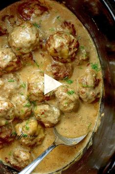 meatballs and gravy in a slow cooker