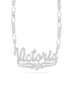 This Name Pendant with Diamond cut "Victoria" is available in either: Silver Plated Gold Plated Sterling Silver and 14K Gold over Sterling Silver. You can choose up to 10 characters (Letters only, NO numbers or special characters).Finished with diamond cuts on heart. Engraved Sterling Silver Chain Necklace For Anniversary, Anniversary Engraved Sterling Silver Chain Necklace, Anniversary Silver Name Necklace With Figaro Chain, Silver Figaro Chain Nameplate Necklace, Elegant Heart Shaped Figaro Chain Necklace, Elegant Heart-shaped Figaro Chain Necklace, Silver Name Necklace With Figaro Chain As Gift, Silver Name Necklace With Figaro Chain For Gift, Silver Figaro Chain Name Necklace As Gift