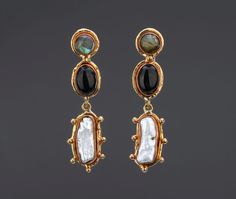 This pair of three-tier mixed stones (labradorite, black onyx, baroque pearl) earrings is a very decorative piece with contrasting colors and textures.  1. Stone shapes and sizes:    top : round labradorite button with a post : 10 mm stone copper bezel set in 14 mm brass base;     middle : oval black onyx button: 14 x 10 mm oval stone copper bezel set in 20 x 14 mm oval brass base.    bottom: a long, textured baroque pearl (23 x 8 mm) set inside a copper bezel on a studded brass base ( 30 x 17 m Elegant Baroque Gemstone Jewelry, Exquisite Gemstone Pearl Earrings As Gift, Exquisite Gemstone Pearl Earrings For Gift, Exquisite Pearl Earrings Gift, Exquisite Pearl Gemstone Earrings As Gift, Black Teardrop Pearl Earrings Gift, Elegant Pearl Drop Earrings With Natural Stones, Elegant Natural Stone Pearl Drop Earrings, Silver Pearl Earrings With Natural Stones