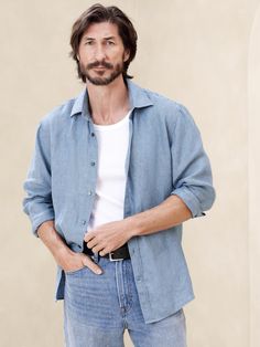 Cut from 100% linen, we love this shirt for its beautiful, natural texture and ability to stay cool and crisp, even in heat and humidity.  Standard fit.  Spread collar with button-front closure.  Shirttail hem.  Standard fit.  Long sleeves.  Hip length.  Model: Size M, 6'2" (188cm). Blue Linen Shirt, Toddler Jeans, Mens Linen, Selling Clothes, Formal Outfit, Formal Shirts, Stay Cool, The Gap, Natural Texture