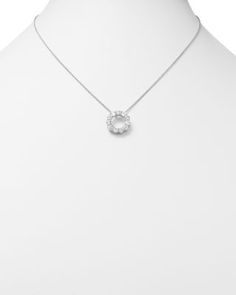 A sparkling diamond circle pendant set in 14K white gold. Diamond Circle Pendant, Circle Pendant Necklace, Circle Diamond, Sparkling Diamond, Exclusive Jewelry, Circle Pendant, Sparkle Diamonds, White Diamonds, Pendant Set