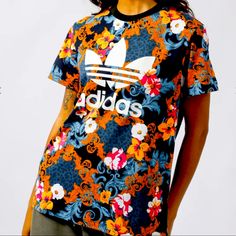 New With Tags Adidas Originals Floral Trefoil Very Oversized Rare Graphic Tee Shirt Size Xs But Will Easy Fit Up To A Large. Blue Adidas T-shirt For Streetwear, Adidas Blue T-shirt For Streetwear, Casual T-shirt With Vibrant Print And Short Sleeves, Casual Short Sleeve T-shirt With Vibrant Print, Casual T-shirt With Vibrant Print, Trendy Blue Floral Print T-shirt, Casual Black Tops With Vibrant Print, Orange Vibrant Print Short Sleeve Tops, Adidas Multicolor Graphic Print Tops