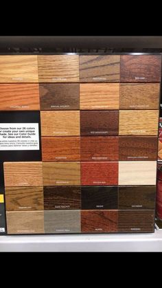 a display case filled with lots of different types of wooden flooring materials and colors