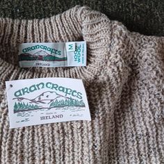 Nwt Aran Crafts Crew Neck Sweater Sz M Fleck Wool Beige Pullover Made In Ireland. Super Warm And Classic Style. Measures 25 Inches Nape To Bottom; 21 Inches Shoulder Seam To Seam; 20inches Shoulder Seam To Wrist. Disclaimer: Most Items I List Are Previously Owned And/Or Vintage, And May Not Be Perfect. I Do My Best To Accurately Describe All Aspects. The Colors Of An Item Might Be A Little Different Than The Photos You See On Your Monitor. Please Carefully Review All Photos Attached, As They Are Made A Part Of The Listing. I Have A Smoke-Free And Pet-Free Environment Once The Items Enter My Home. Fisherman Knit Sweater, Long Cable Knit Cardigan, Irish Sweater, Cable Knit Sweater Womens, Beige Pullover, Cable Knit Sweater Cardigan, Aran Sweater, Cashmere Sweater Women, Cardigan Sweater Coat