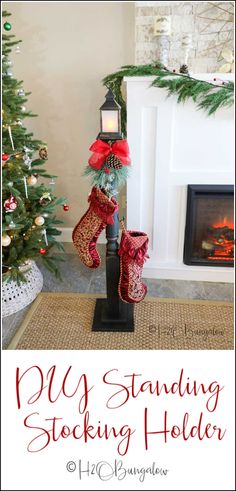 stockings are tied to a post in front of a christmas tree with the words diy standing stocking holder