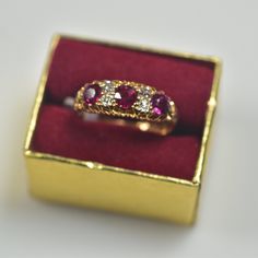 British hallmarks, natural mine cut vivid red rubies, old mine cut diamonds. 18 karat assay mark British Sheffield hallmark (Crown) T hallmark age 1787 1.0 carats total weight of fine natural rubies .20 carats of natural old mine cut diamonds Some normal wear for the age of the ring, sold as is Classic Red Diamond Ring With Single Cut Diamonds, Classic Red Ruby Ring With Single Cut Diamonds, Red Ruby Ring With Vvs Clarity Diamond, Red Ruby Ring With Single Cut Diamonds, Formal Ruby Diamond Ring With Single Cut Diamonds, Antique Red Diamond Ring With Gemstone, Antique Red Gemstone Diamond Ring, Antique Ruby Ring With Single Cut Diamonds, Red Ruby Diamond Ring Hallmarked