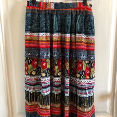 This Light Weight Viscose Skirt Is The Perfect Little Number With Great Print. Zipper Up The Back. Patterned Long Skirt For Summer, Patterned Summer Skirt, Summer Patterned Skirt, Summer Patterned Bottoms With Lined Skirt, Vintage Mini Skirt With Flowy Design, Patterned Long Skirt With Lining, Multicolor Midi Skirt, Long Patterned Lined Skirt, Multicolor Long Pleated Skirt