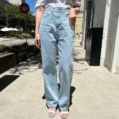 DESCRIPTION This baggy jean is featured in a high-rise with straight-out silhouette. DETAILS Zip fly and button closure, Belt loop at waist FIT & SIZEING 25" waist 35" hip 28 1/2" inseam based on size SModel is 5'2" waist (25"-26") is wearing a size S PRODUCT INFO & CARE Size: S,M Color: Denim ● Fabric: 100% cotton● Machine wash cold gentle cycle. Do not bleach Baggy Medium Wash Jeans With Belt Loops, Baggy Light Wash Denim Bottoms, Baggy Light Wash Denim Cargo Jeans, Baggy Mid-rise Jeans With Button Closure, Light Wash Baggy Full-length Jeans, Baggy Jeans, Small Waist, Denim Fabric, High Rise