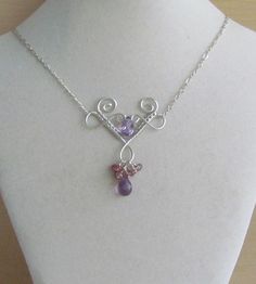 Amethyst and Sapphire Woven Necklace by MuseHill on Etsy Silver Amethyst Briolette Necklace, Elegant Amethyst Wire Wrapped Necklaces, Elegant Wire Wrapped Amethyst Necklace, Elegant Amethyst Wire Wrapped Necklace, Purple Briolette Sterling Silver Necklace, Pink Amethyst Wire Wrapped Jewelry, Purple Briolette Wire Wrapped Jewelry, Handmade Delicate Purple Necklace, Handmade Lavender Sterling Silver Necklace