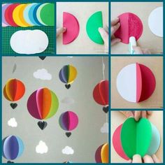 there are many different pictures of hot air balloons hanging from the ceiling, and one is made out of paper