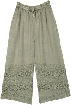 Free flowing stonewashed straight-leg pants are the perfect for any season. They impart effortless style with floral embroidery and floral patchwork in the same blue color and the rayon keeps you cool, the stonewashed look gives a unique style. #tlb #SplitSkirtsPants #Stonewash #Embroidered #Misses #Pocket #Summerpants #greenpants #greenstreetpants