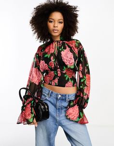 Top by ASOS DESIGN Waist-up dressing Floral design Tie neck Blouson sleeves Cropped length Regular fit Chic Floral Print Top With Lantern Sleeves, Chic Long Sleeve Smocked Top With Floral Print, Trendy Long Sleeve Smocked Top With Floral Print, Pink Floral Print Smocked Top With Long Sleeves, Pink Long Sleeve Tops With Elastic Sleeves, Pink Floral Print Long Sleeve Smocked Top, Pink Floral Print Smocked Long Sleeve Top, Chic Long Sleeve Tops With Rose Print, Fitted Long Sleeve Blouse With Rose Print