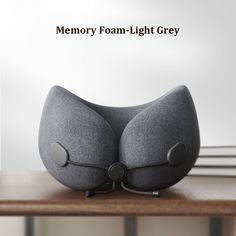 an image of a memory foam - light grey pillow on a table with the words memory foam - light grey