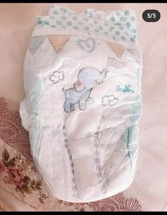 a baby diaper with an elephant on it