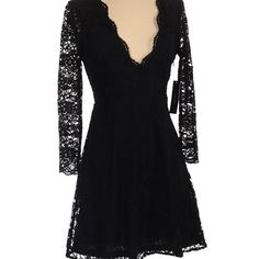 65% Nylon, 35% Cotton 3/4 Sleeve V-Neck Mini Silhouette Solid Embroidered Detail Black Short Size S - Sizing Chart 27" Chest, 32" Length Fitted New With Tags L1 V-neck Mini Dress With Lace Sleeves For Party, Fitted V-neck Mini Dress With Scalloped Lace, Fitted V-neck Lace Dress For Party, Long Sleeve Lined Party Dresses, V-neck Mini Dress With Lace Sleeves For Night Out, Spring V-neck Lace Dress For Night Out, Fall Evening Dress With Scalloped Lace, Scalloped Lace Evening Dress For Fall, Fitted V-neck Lace Dress For Evening