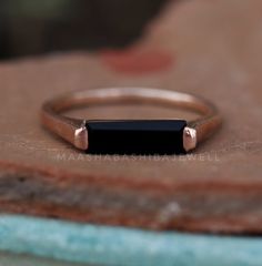 "Black Onyx Hydro Ring, Engagement Ring, 18k Rose Gold Vermeil, Stackable Ring, Rectangular Stone Ring, Black Onyx  Bar Ring, Minimalist Ring SHOP LINK:- https://www.etsy.com/shop/MaaShabashibaJewell?ref=seller-platform-mcnav 》D E T A I L S《 Gemstone: Black Onyx                     Gem Color: Black                      Gem Shape: Rectangular                         Gem Category: Cut                    Metal: 925 Sterling Silver Purity: 925 Parts Per 1000 Setting Type: Channel Set Silver Polish: High Ring Size: All Size Available Please note that there Can be slight variations in stone texture and color shades in the actual product that you receive. The stone quality or grade will be the same. Because We Use Natural Stones And All Natural Stones Are Not Of Same Textured. All Our Jewelry Is Onyx Bar, Black Gems, Bar Ring, Stone Texture, Ring Minimalist, Minimalist Ring, Ring Black, Stackable Ring, Minimalist Rings