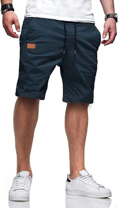 Stay cool and comfortable during the summer heat with our Breathable Comfort Drawstring Summer Shorts. These shorts are made from a lightweight and breathable fabric that keeps you feeling fresh all day long. The array of color options will give you the freedom to choose your favorite color. Details: Closure: Drawstring Machine Wash Fabric Type: Cotton, Elastane Pockets: 4 Pockets Season: Spring, Summer Size Chart: Size USA Waist (in) Hip (in) Inseam (in) Thigh (in) Length (in) 32 S 31.5 42.5 9. Mens Casual Shorts, Womens Tennis Dress, Athletic Dresses, Mens Knit Sweater, Paisley Shorts, Casual Styles, Womens Tennis, Active Shorts, Men's Knit