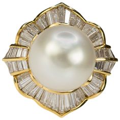 Stunning 13.5mm South Sea Pearl set in 18k yellow gold ring with 46 bagueete diamonds weighing approximately 2.00 carats. South Sea Pearl Ring, Pearl Diamond Ring, Magnificent Jewels, Bijoux Art Nouveau, Pearl Jewelry Design, Diamond Ice, Real Gold Jewelry, Pearl And Diamond Ring, Pearl Jewellery