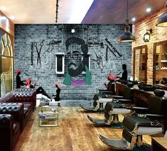 a barber shop with brick walls and lots of chairs