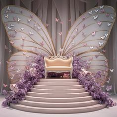 a white chair sitting on top of a set of stairs next to a giant butterfly