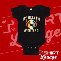 "\"It's Ok I'm With The DJ\" Baby Bodysuit or Toddler T-Shirt is a perfect gift for any disc jockey parents, a unique pregnancy announcement/reveal, the future DJ baby, or just because it is so cute! It's also a great gift for a baby who is a music lover. Don't forget to snap a picture of baby in this adorable outfit with their favorite disk jockey.  Need a customization? We are happy to help, feel free to send us a message.  This creeper/toddler shirt is sure to put a smile on anyone's face who Funny Fitted Black Onesie, Unique Pregnancy Announcement, Baby Present, Baby Presents, Disc Jockey, It's Okay, Vinyl Crafts, Music Lover, Gender Neutral Baby