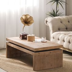 a living room with a couch, coffee table and an old - fashioned record player