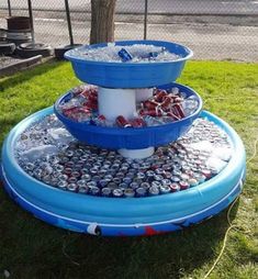 an inflatable water fountain made out of soda cans is shown with the caption saying, such a genius cooler for a party yay or nay?