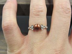 All orders ship via USPS first class mail. I will process your order and ship it within 1 business day of payment. I only ship within the United States. Please don't hesitate to message me with any questions or concerns. Lot 40.17 Handmade Brown Ring For Wedding, Brown Round Jewelry For Anniversary, Elegant Brown Stackable Jewelry, Adjustable Brown Jewelry For Anniversary, Wedding Promises, Rare Gems, Engagement Anniversary, Estate Wedding, 10k Gold