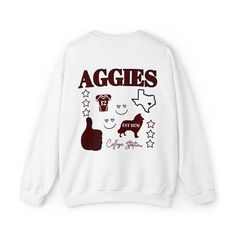 Maroon Aggies Sweatshirt, Texas Pullover, Aggies Gear, Gifts for Her Aggies, Sweatshirts for Her, College Station Sweatshirt - Etsy Oversized School Spirit Sweatshirt With Graphic Print, Oversized School Spirit Graphic Sweatshirt, Oversized Graphic Print Sweatshirt For School Spirit, Oversized Winter Tops For School Spirit, Varsity Sweater With Graphic Print And Relaxed Fit, Collegiate Letter Print Top, Varsity Sweater With Graphic Print In Relaxed Fit, Varsity Graphic Print Top For Loungewear, Collegiate Letter Print Tops For Loungewear