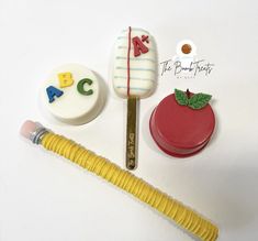 a cake shaped like an apple and some other items