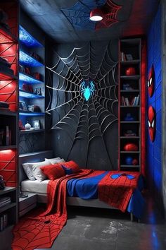 a bedroom decorated in red, blue and black with spider - man decorations on the walls