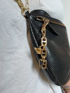 Upgrade your bag game with the Bianca Bag charm. This beautiful chain link charm will elevate any bag, adding a touch of elegance and style. Accessorize like a pro and make a statement with the Bianca Bag charm. Luxury Metal Bags As Gifts, Luxury Metal Bag As Gift, Luxury Shoulder Bag With Chain As Gift, Luxury Chain Bags As Gift, Luxury Chain Bag As Gift, Luxury Bag Charm With Keychain, Luxury Metal Bags With Chain Strap, Luxury Metal Bag With Chain Strap, Luxury Bags With Logo Charm For Gift